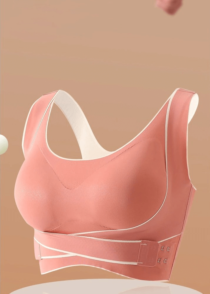Stylish pink sports bra with elastic cross back and front closure for women, featuring breathable, anti-sweat material - Model SF0483